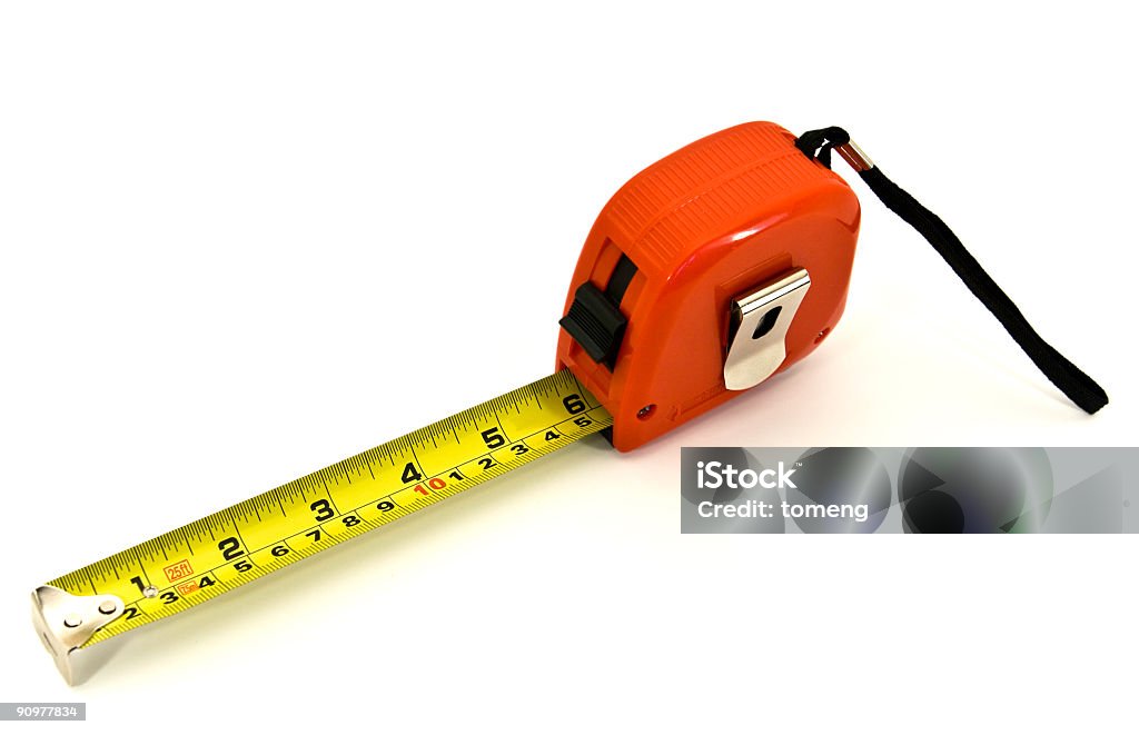 Measuring Tape Isolated on White Background A measuring tape isolated on a white background. Carpentry Stock Photo