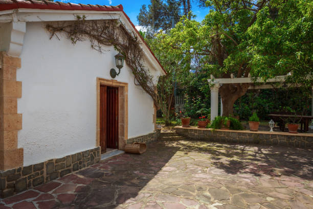 istock White lodge in a garden 909782242