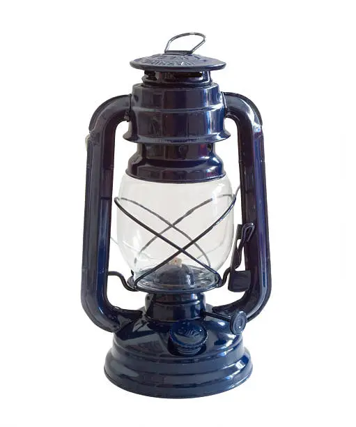 An old blue oil lamp isolated on white