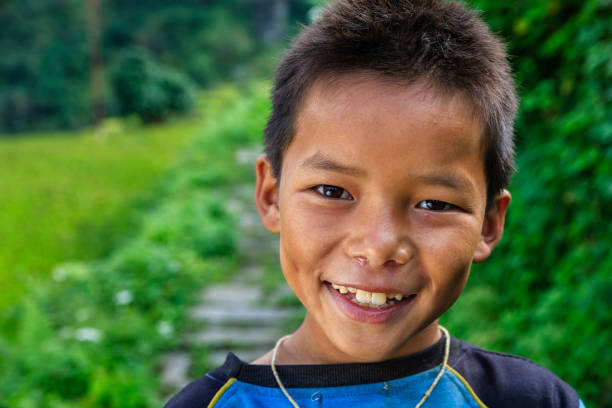 istock Happy Nepali boy near Annapurna Range 909784922