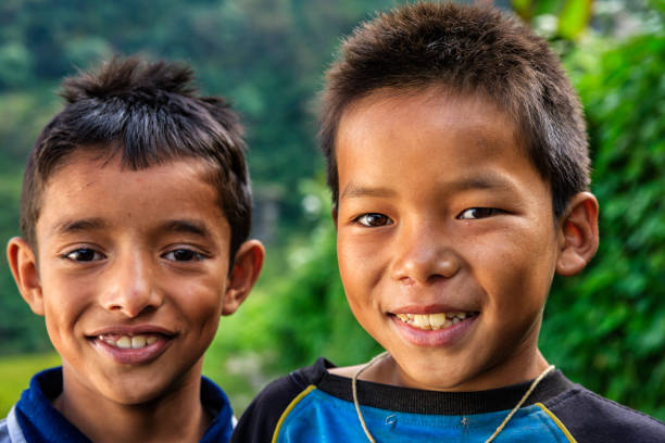 istock Happy Nepali boys near Annapurna Range 909785000