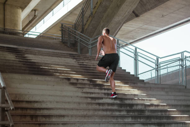istock Running up the stairs 909785040