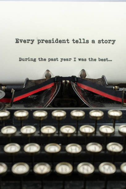 istock Close-up antique typewriter with words president story 909785564