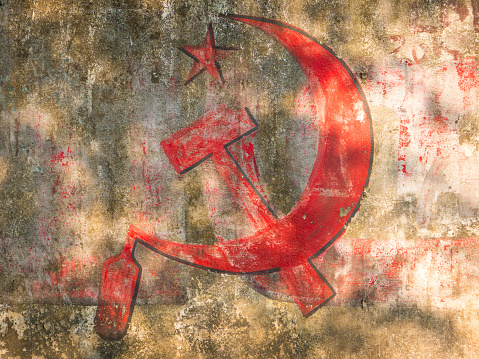 Alleppey, Kerala, India. 01/01/2018. A communist party tag on a wall in a street in Alleppey. The communist party is very present in Kerala, India.