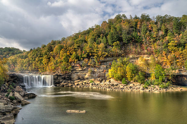 Beautiful Cumberland Falls with a rocky forested landscape