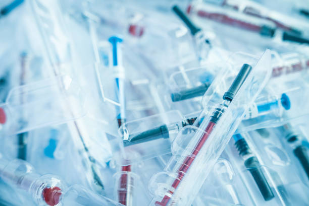 Medical waste, therapeutic syringes in packaging stock photo