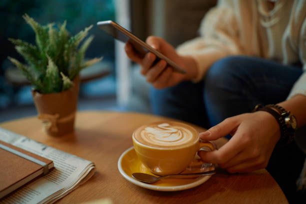 istock Sipping coffee and cathcing up online 909792156