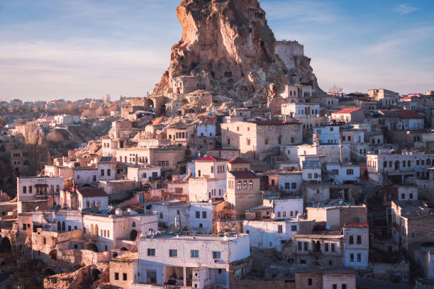 Ortahisar cave city in Cappadocia, Turkey on sunset
