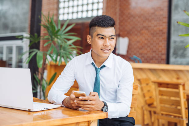 istock Young Thai businessman is responsible for his business 909805520