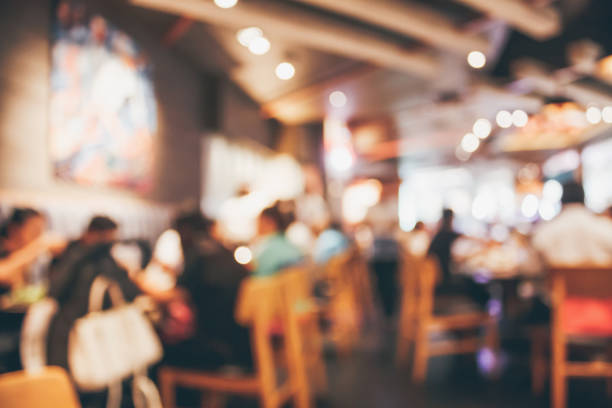 Restaurant cafe or coffee shop interior with people abstract defocused blur background