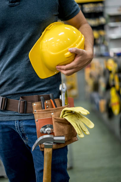 istock Close-up on a handyman at a hardware store 909805960