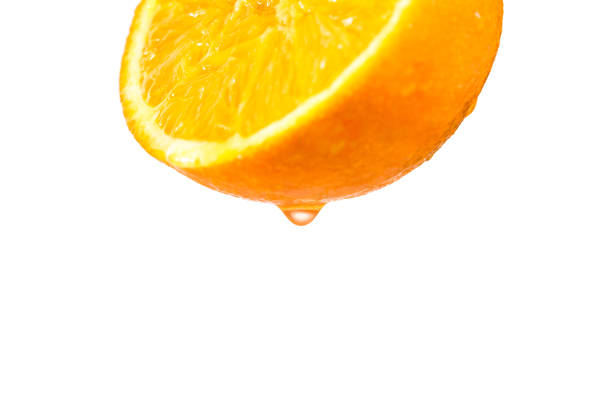 istock A cut orange isolated on a white background 909807310