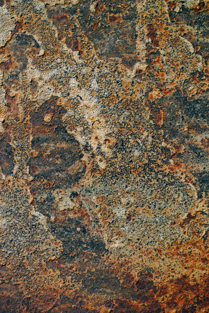 istock texture of rusty iron, cracked paint on an old metallic surface, sheet of rusty metal with cracked and flaky paint,  corrosion, decay metal background, decay steel, decay 909816936