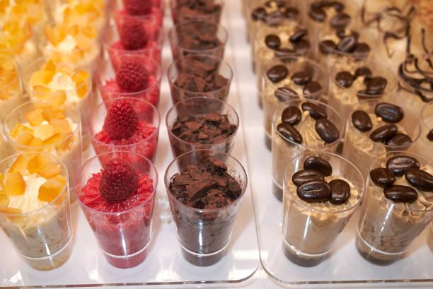 istock Small glasses with ice cream dessert 909817806