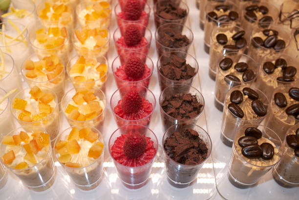 istock Small glasses with ice cream dessert 909817814