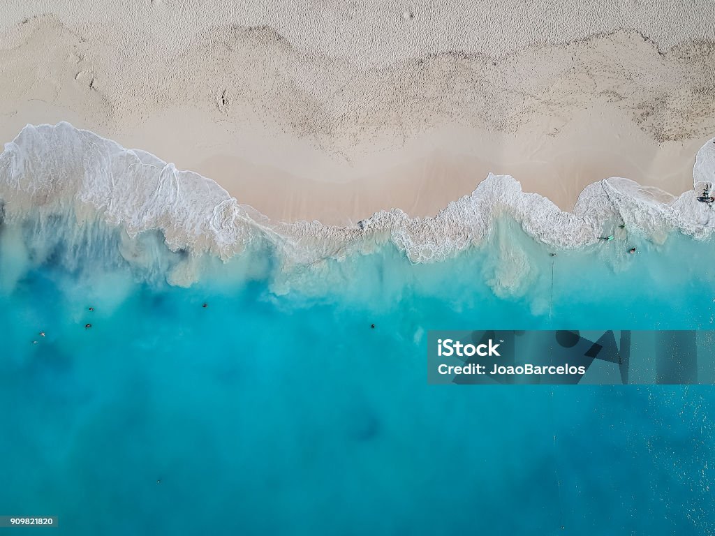 Drone photo Grace Bay, Providenciales, Turks and Caicos Drone photo of Grace Bay, Providenciales, Turks and Caicos. Only the caribbean blue sea and white sandy beaches can be seen Beach Stock Photo