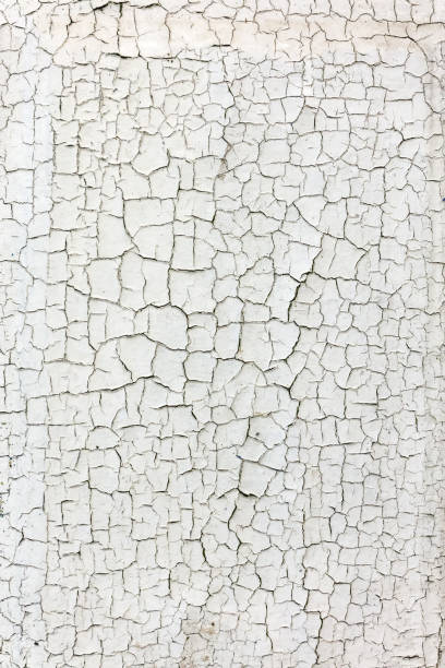 white painted wooden background with cracks