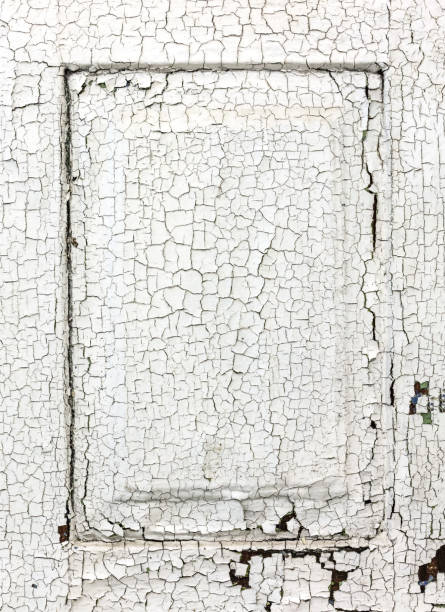 istock old wooden window shutters with cracked white paint 909833184