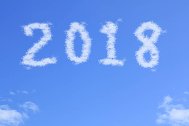 istock cloudy blue sky background or 2018 new year business concept 909839726