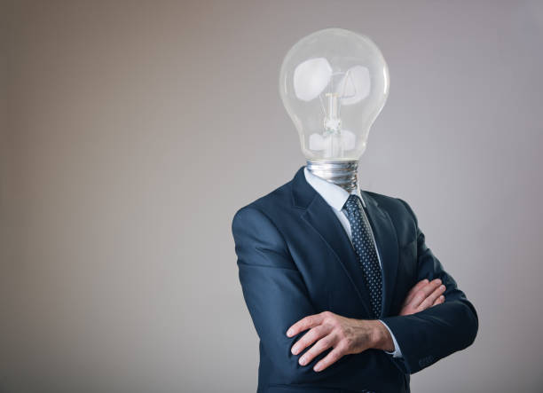 istock Lamp head business man, idea personified 909840452