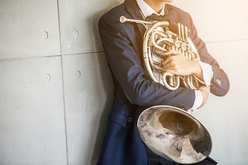 French horn music instrument orchestra classic hornist and Musicians are embracing the horn
