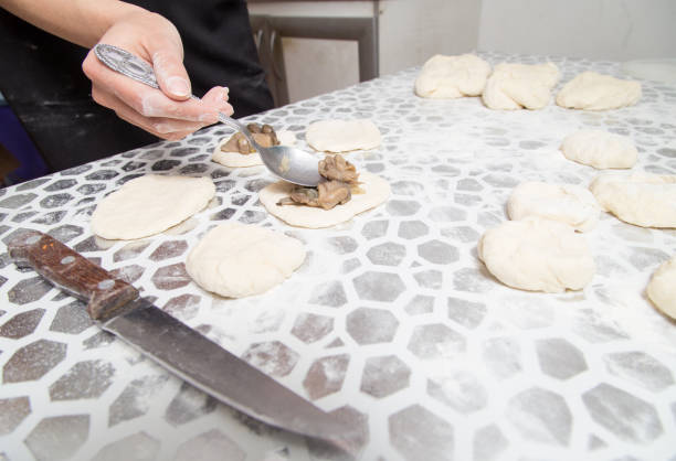 istock cooking cakes of the dough in the kitchen 909843860