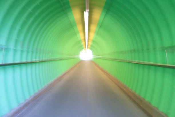 istock deep of green color tunnel horror feel 909846508