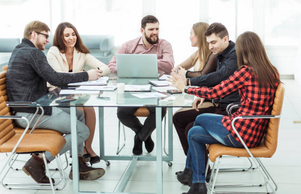 istock business team holding a working session at the working place in office 909850488