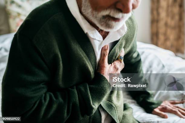 An Elderly Indian Man With Heart Problems Stock Photo - Download Image Now - Heart Attack, Heart Disease, Chest Pain