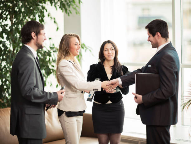 istock Business meeting handshake business partners 909851064