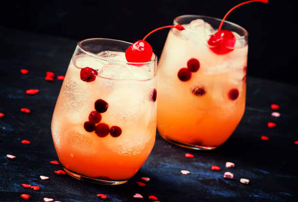 istock Festive red cocktail with maraschino cherries for Valentine's day 909861878