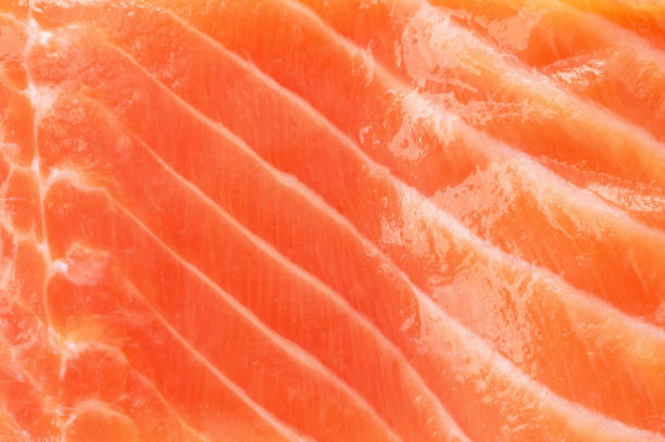 istock salmon red fish closeup texture fresh 909870684