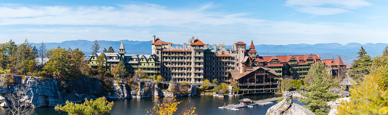 Mohonk Lake, NY, USA - October 19, 2017: Visitors enjoy a warm fall afternoon on Picturesque Mohonk Lake in the Hudson Valley in the Fall of 2017.