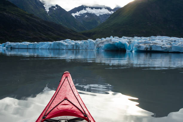 istock Spencer Glacier terminal face viewed from a red kayak in the terminal lake 909871076