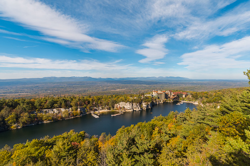 Mohonk Lake, NY, USA - October 19, 2017: Visitors enjoy a warm fall afternoon on Picturesque Mohonk Lake in the Hudson Valley in the Fall of 2017.