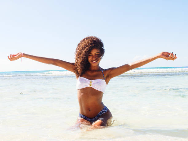 istock Bathing in the Caribbean sea 909878224