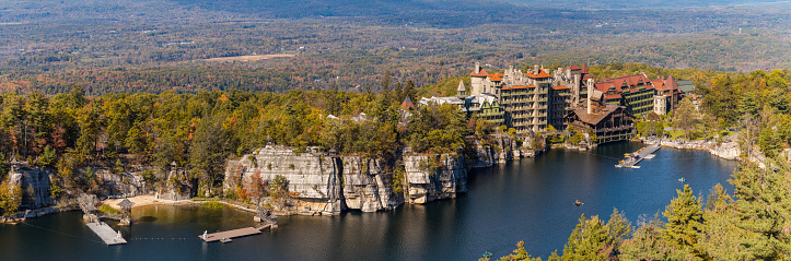 Mohonk Lake, NY, USA - October 19, 2017: Visitors enjoy a warm fall afternoon on Picturesque Mohonk Lake in the Hudson Valley in the Fall of 2017.