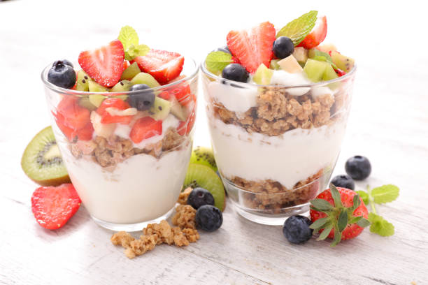istock yogurt, muesli and fruits 909879070
