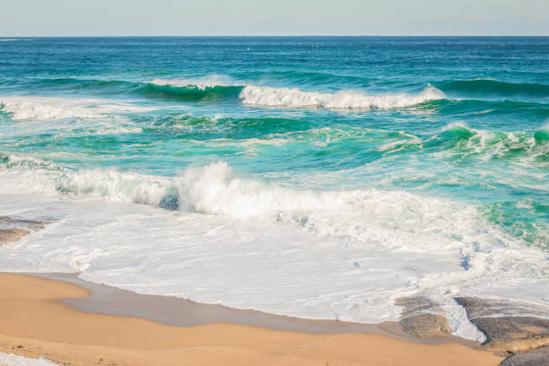 istock Sea and surf and rock 909882014