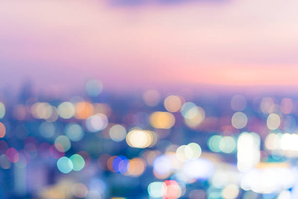 istock Blurred scene of city view at night time 909882952