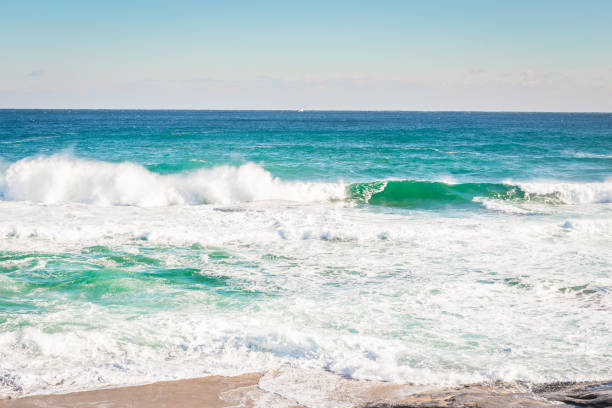 istock Sea and surf and rock 909883018