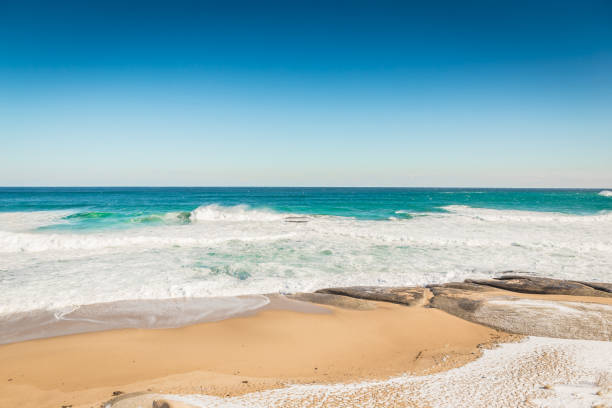 istock Sea and surf and rock 909883126