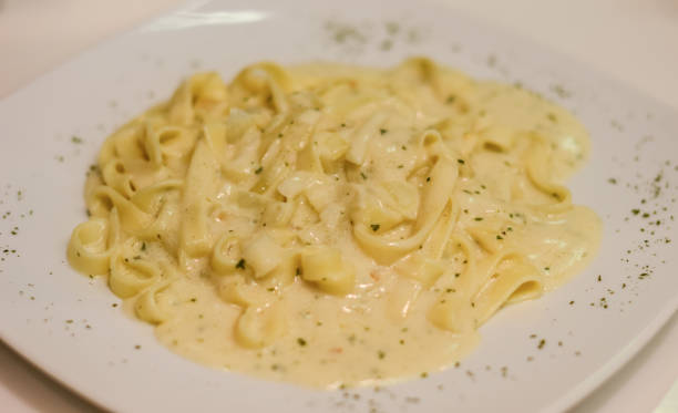 istock Pasta with cream cheese sauce 909883406