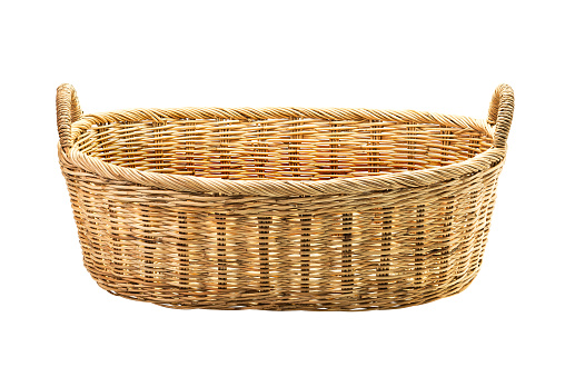 Rattan wicker basket for cloth isolated on white background with clipping path