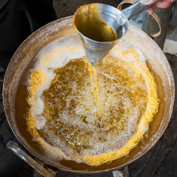 istock Hand are making of Thai dessert. 909894870