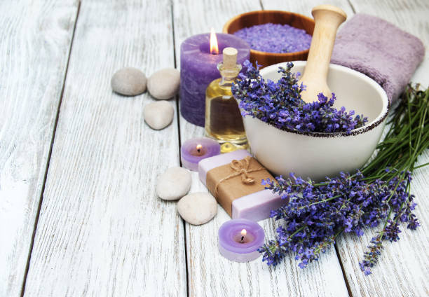 istock Spa products and lavender flowers 909896406