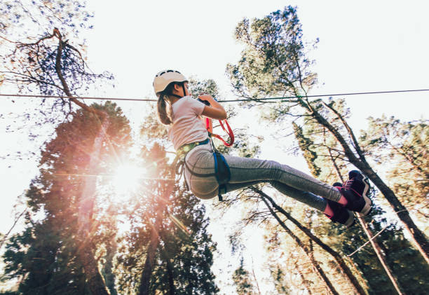 istock Girl in adventure park 909899424