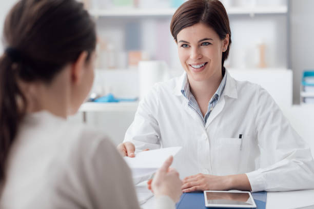 istock Doctor giving a prescription 909903488