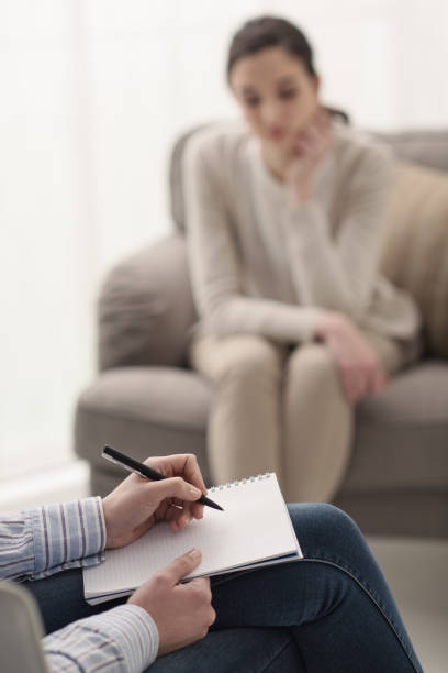 istock Psychologist listening to her patient 909903532