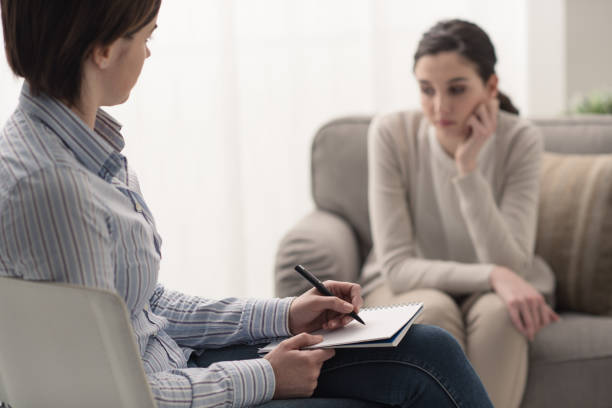 istock Psychologist listening to her patient 909903710